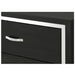 Black Giga 4-drawer bedroom accent chest with silver handles, showing the front view of the storage furniture piece.