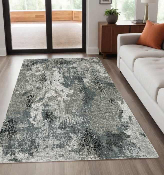 5' x 8' Abstract Power Loom Stain Resistant Area Rug - Ivory Gray Charcoal Blue And Navy