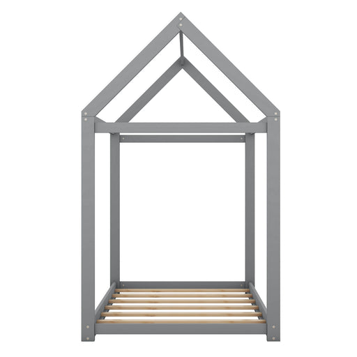 Wooden house-shaped platform bed by Giga with a cozy, natural wood finish, featuring a charming house design and sturdy frame.