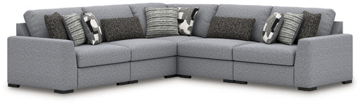 Bealton 5-piece stationary sectional sofa by Benchcraft® with plush cushions and modern design, shown in a spacious living room setting.