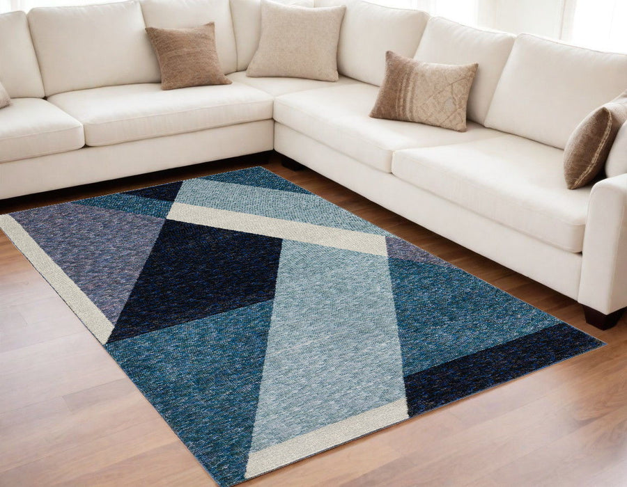 5' x 7' Geometric Power Loom Area Rug - Blue Purple Gray And Teal