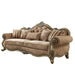 HomeRoots velvet floral sofa with champagne legs and matching toss pillows, brown stationary sofa with elegant design.