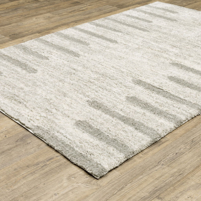 10' x 13' Geometric Shag Power Loom Stain Resistant Area Rug - Ivory And Gray