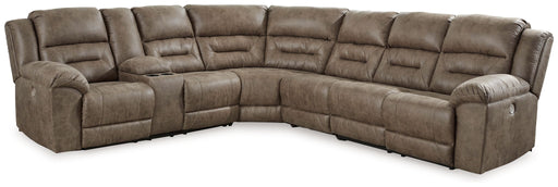 Signature Design by Ashley Ravenel 4-piece reclining sectional sofa in dark gray fabric, with plush cushions and reclining features.