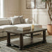 Rectangular cocktail table from Signature Design by Ashley® with a sleek wooden surface and modern design.