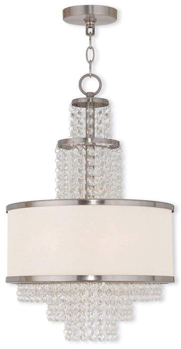 HomeRoots 22-inch metal chandelier with three shades, dimmable, featuring nickel finish and clear/off-white shades.