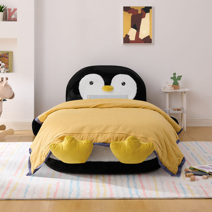 White and black twin size penguin-shaped upholstered bed for kids, featuring a cozy lounger chair design by Giga.