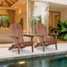 Set of two Giga wooden outdoor Adirondack lounge chairs made of solid cedar, perfect for garden patio relaxation.
