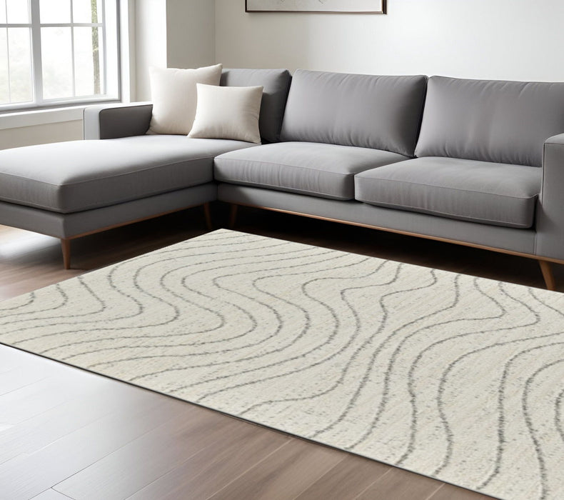7.8' x 10.8' Abstract Area Rug - Cream And Beige