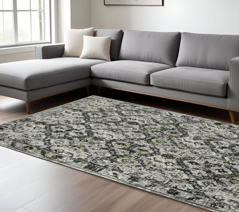 6' x 9' Oriental Power Loom Stain Resistant Area Rug - Ivory Charcoal Gray Blue Rust Gold And Brown