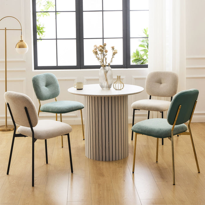 Modern 5-piece Giga dining set with bamboo table and turquoise chairs with metal legs, space-saving design in white.