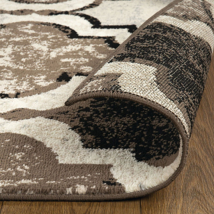 9' x 12' Quatrefoil Power Loom Distressed Stain Resistant Area Rug - Ivory