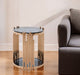 HomeRoots round end table with glass top, stainless steel frame, rose gold finish, and black shelf for modern living spaces.