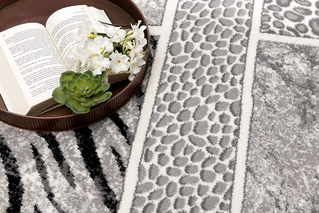 8' x 11' Geometric Power Loom Stain Resistant Area Rug - Gray