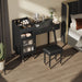 Modern black Giga makeup vanity desk with drawers, charging port, engineered wood, space-saving design for small spaces.