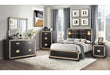 Black and gold accent nightstand with a sleek design, featuring a drawer and open shelf for modern bedroom decor.
