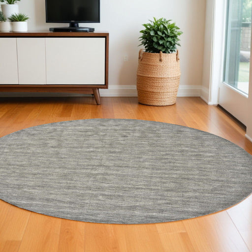 Gray and ivory 10-foot round wool hand-woven area rug by HomeRoots with intricate woven pattern and soft texture.