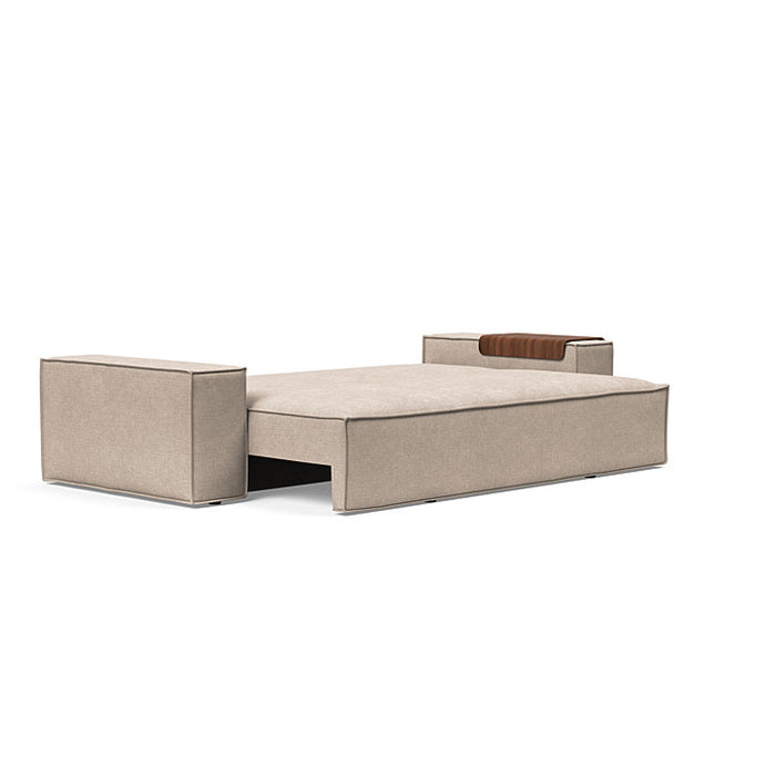 Innovation Living Newilla sofa bed with wide arms, modern design, featuring plush cushions and a sleek style for versatile living spaces.