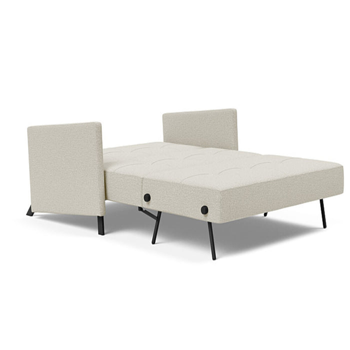 Innovation Living Cubed full size sofa bed with arms, showcasing its modern design and comfortable seating in a living room setting.