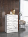 White and grey J & M Furniture Nina accent chest with sleek drawers, modern design, and stylish storage for living spaces.