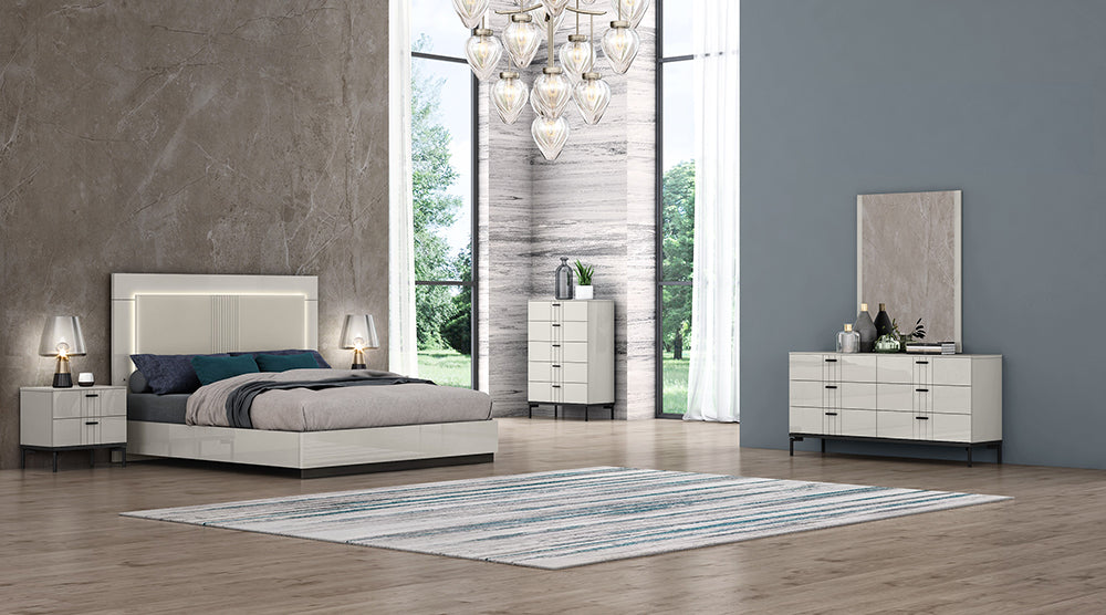 J & M Furniture Bella accent night stand with a sleek wooden finish and single drawer for modern bedroom storage.