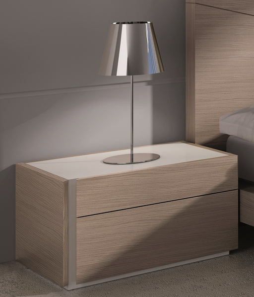 Left facing J & M Furniture Evora accent nightstand with a modern design, featuring a drawer and open storage compartment.