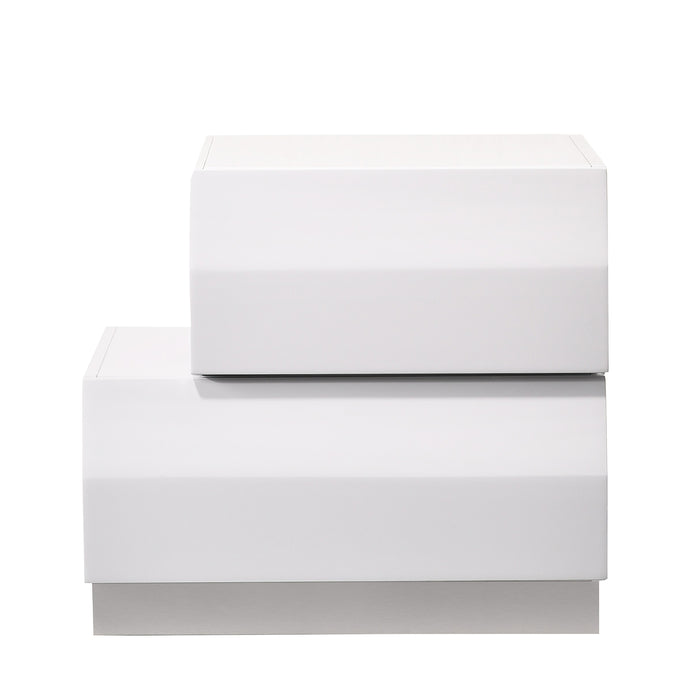 White Milan left-facing accent nightstand by J & M Furniture with sleek modern design and clean lines.