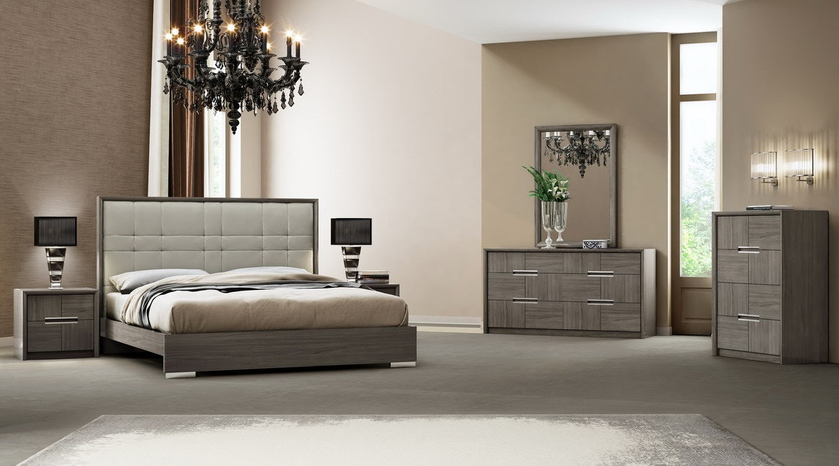 J & M Furniture Copenhagen K Bed with sleek wooden frame and modern design, shown in a well-lit bedroom setting.
