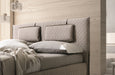 J & M Furniture Evergreen Queen Bed with wooden frame and headboard, showcasing a modern bedroom furniture design.