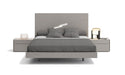 Grey J & M Furniture Faro king size bed with a modern upholstered headboard and sturdy frame.