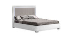 Luxuria King Bed by J & M Furniture featuring a stylish upholstered headboard and elegant wooden frame.