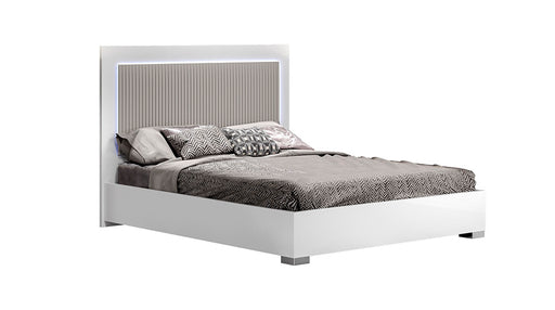 Luxuria King Bed by J & M Furniture featuring a stylish upholstered headboard and elegant wooden frame.