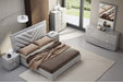 Grey queen bedroom bed by J & M Furniture featuring a modern headboard and sturdy wooden frame.