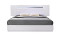 White Palermo king size bed by J & M Furniture with a modern design and sturdy wooden frame.