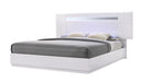 White Palermo King Size Bed by J & M Furniture with sleek, modern design and sturdy frame, shown in a well-lit bedroom setting.