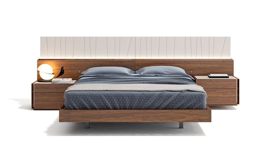 Walnut Porto king size bed by J & M Furniture with sleek wooden frame and modern design for a stylish bedroom.