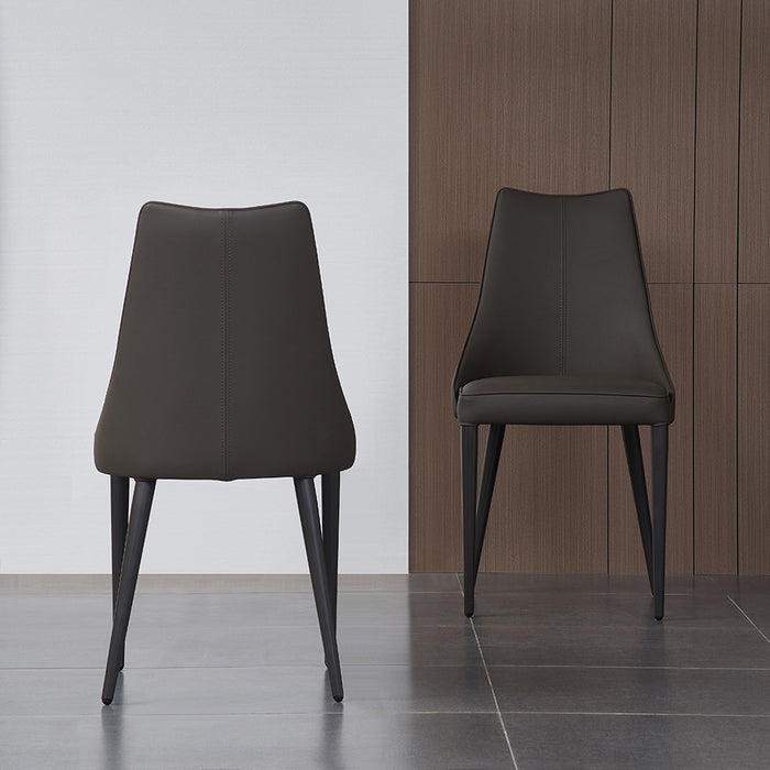 Grey J & M Furniture CE Bosa Moderna dining chair from a set, showcasing modern design and comfortable seating.