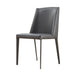 Dark grey J & M Furniture MC Reno dining chair from a set, featuring modern design and comfortable upholstered seating.