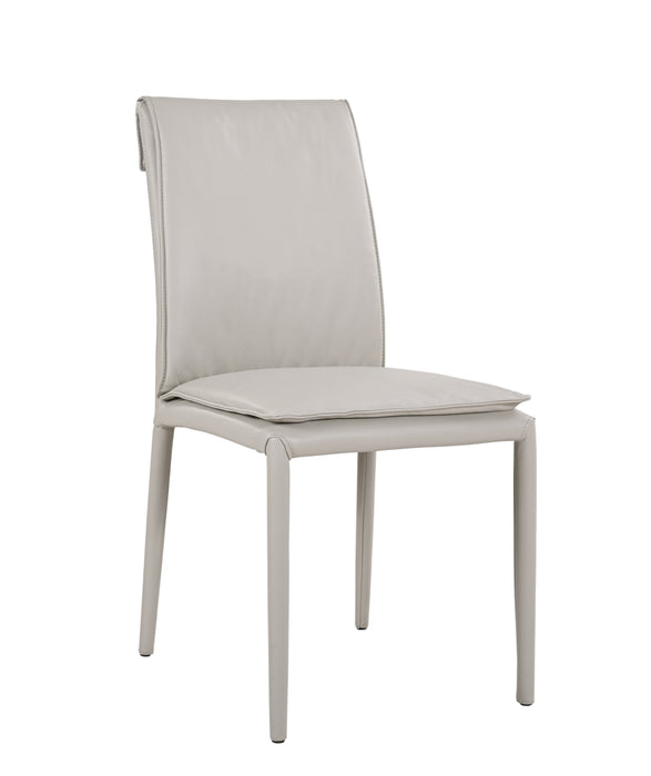 Light grey J & M Furniture Togo dining chair with sleek modern design, shown from the side.
