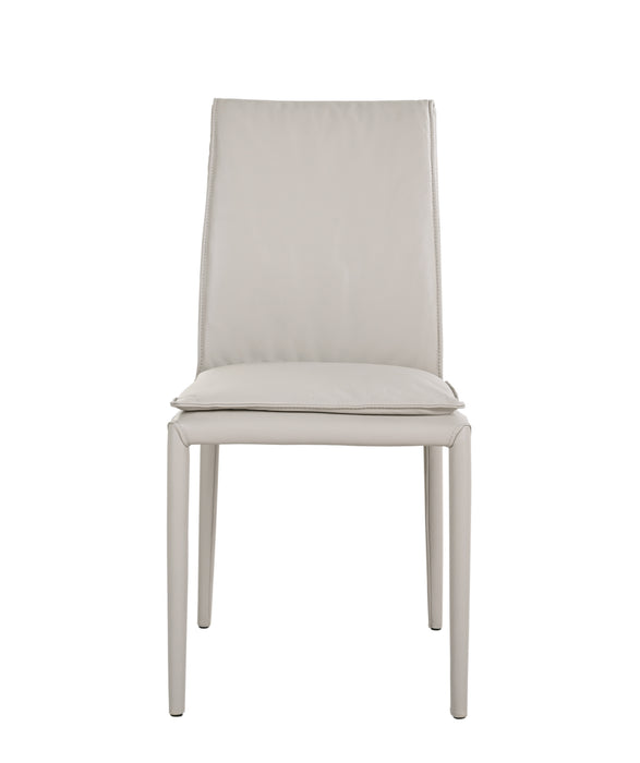 Light grey J & M Furniture Togo dining chair with a sleek, modern design, shown from the front view.