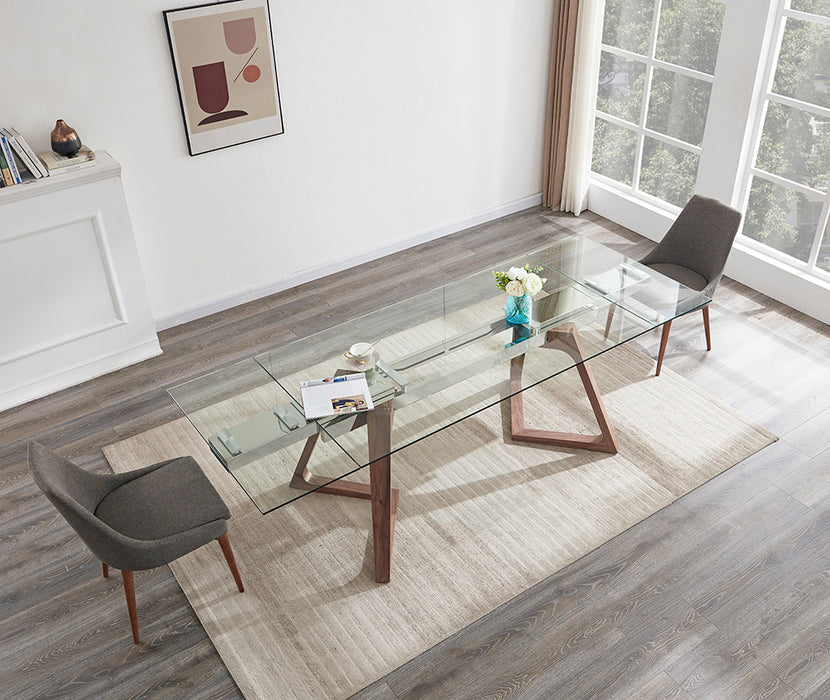 J & M Furniture MC Class extension dining table with wood finish and extendable leaf, ideal for versatile dining room setups.