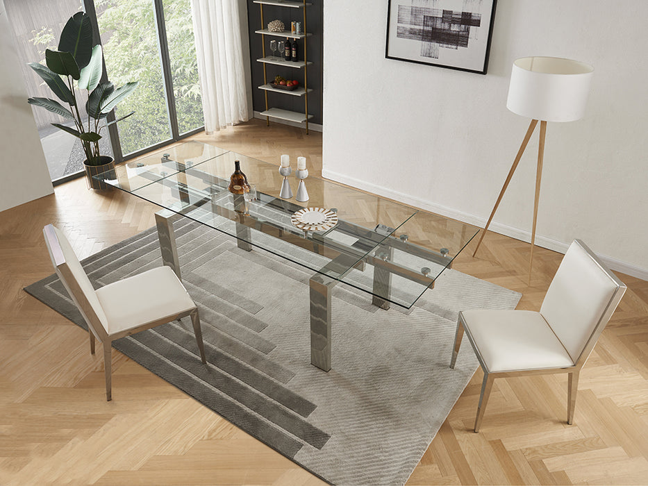 J & M Furniture MC Moda extension dining table with sleek wooden surface and extendable leaves for flexible seating.