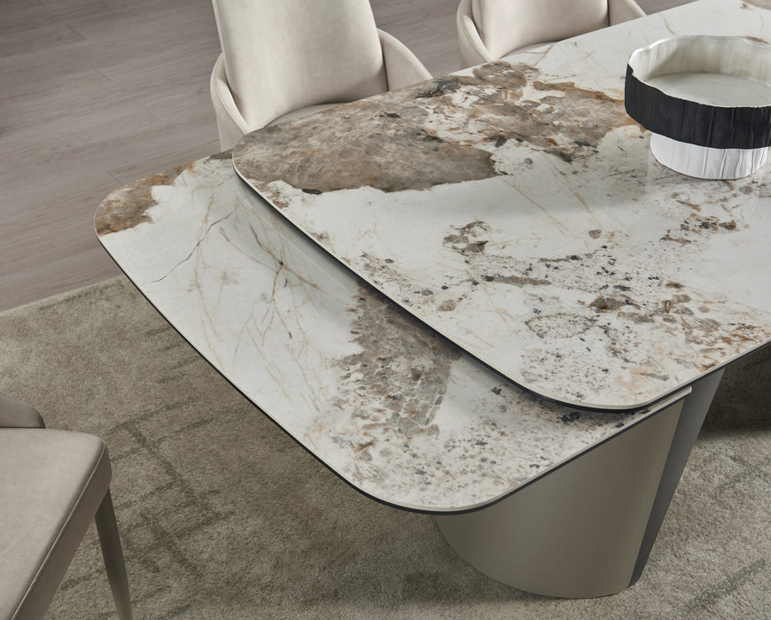 J & M Furniture RH Morandi extension dining table with sleek wooden finish, shown extended in a modern dining room setting.