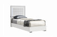 White high gloss full bed by J & M Furniture with sleek modern design and clean lines, shown in a well-lit bedroom setting.