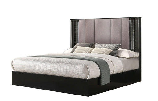 Black J & M Furniture Rosette King Bed with a sleek upholstered headboard and modern design in a bedroom setting.