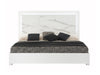 J & M Furniture Sonia King Bed in white and grey with a modern upholstered headboard and sleek design.
