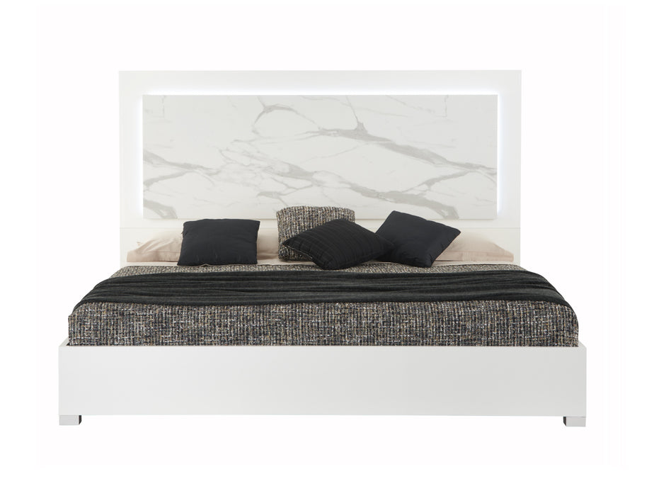 J & M Furniture Sonia King Bed in white and grey with a modern upholstered headboard and sleek design.