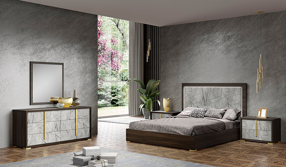 J & M Furniture travertine mirror with wenge and gold finish, showcasing a modern rectangular design with sleek edges.