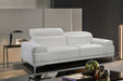 White J & M Furniture Nicolo Queen Bed with plush upholstery and modern design, shown in a spacious bedroom setting.