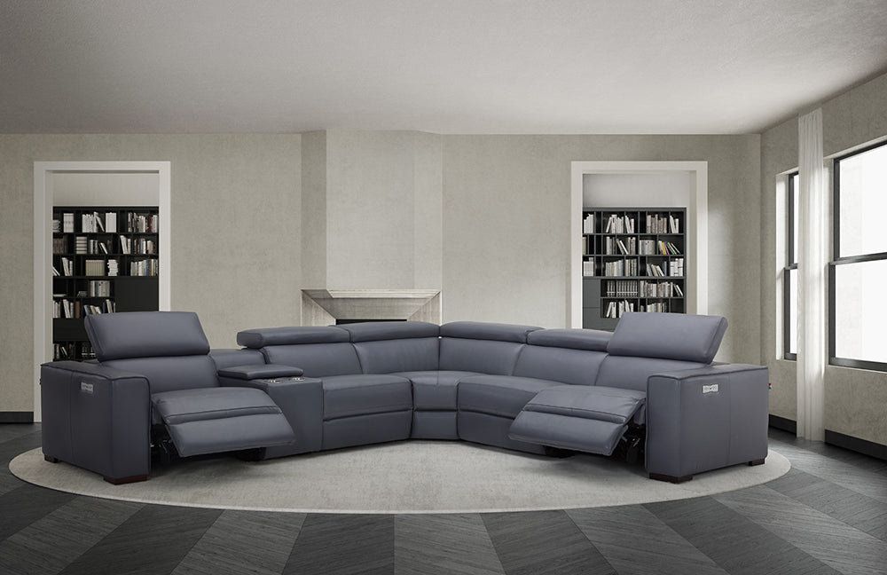 Blue grey J & M Furniture Picasso motion sectional sofa with plush cushions and modern design.